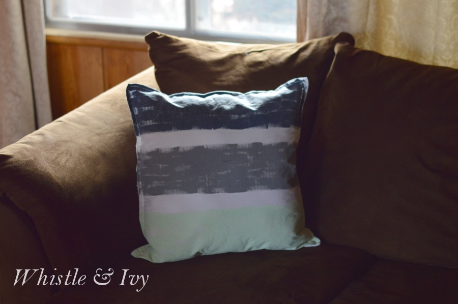 These hand-painted throw pillows are fun to make, easy to customize and an inexpensive room update! 