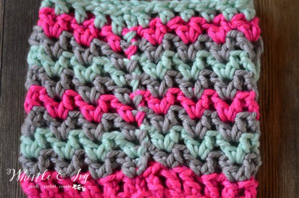 FREE Crochet Pattern: Chunky V-Stitch Cowl | Snuggle into this cozy V-stitch cowl worked with chunky yarn. It keeps your neck and chin warm and toasty!