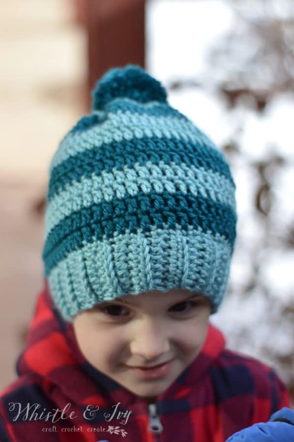 FREE Crochet Pattern: Schoolyard Pom Pom Hat - The perfect simple striped hats for kids!
