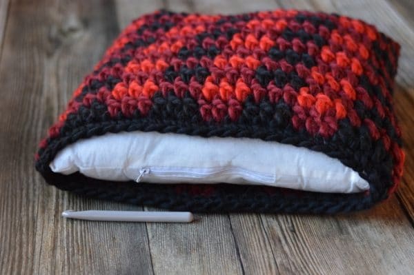 FREE Crochet Pattern: Crochet Plaid Pillow | Make this cozy plaid pillow, the perfect accent for your rustic holiday or cabin retreat. 