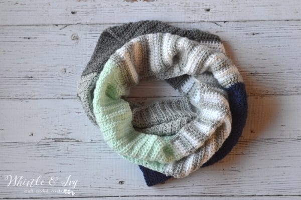 FREE Crochet Pattern: Stripes and Solids Crochet Scarf | Mix and match your favorite colors while making this pretty scarf! Beginner friendly! 