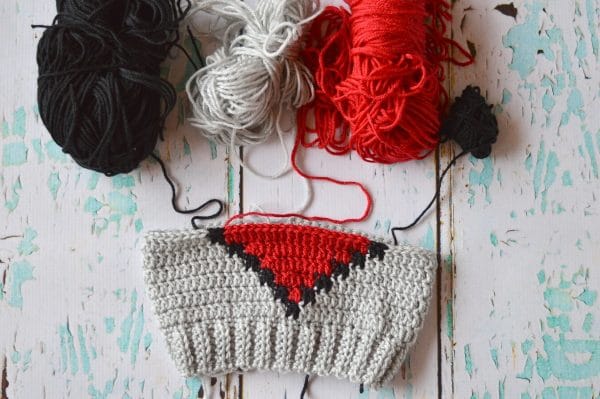 FREE Crochet Pattern: Crochet 8-Bit Heart Slouchy | A little bit of Valentine's Day, a little bit of geek, this cute 8-bit heart hat is fun for all. 