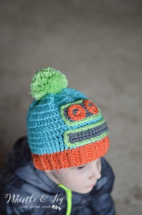 FREE Crochet Pattern: Kid's Robot Hat | Make this cute robot-themed hat for your child! Perfect for ages 4-10. 