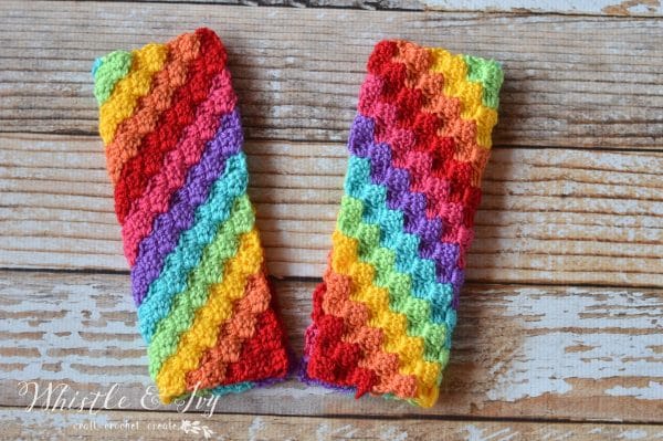 FREE Crochet Pattern: Crochet Rainbow C2c Arm Warmers | Learn how to work the fabulous C2C crochet technique and make these bright and fun arm warmers. 
