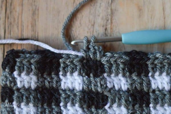 Crochet Plaid Stitch - This stitch gets an update! Learn to work this stitch with a less noticeable seam. New to crochet buffalo plaid? Learn more here!