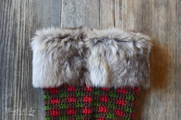 FREE Crochet Pattern: Crochet Plaid Stocking | Bring a rustic and classic look to your holiday decor with these fur-topped Christmas Stockings. 