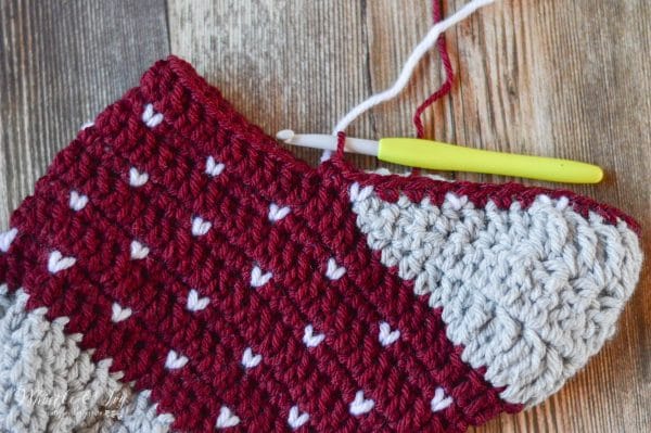 FREE Crochet Pattern: Crochet Snowfall Stocking | This classic and simple stocking is perfect for your rustic Christmas! Learn the easy Snowfall Technique. 