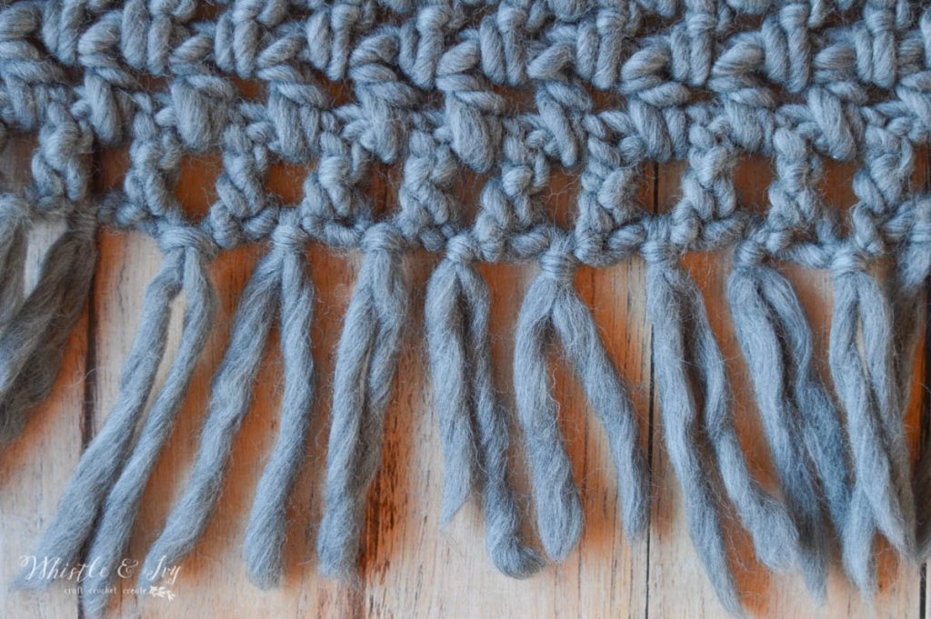 bulky chunky fringe on edge of crochet infinity scarf 