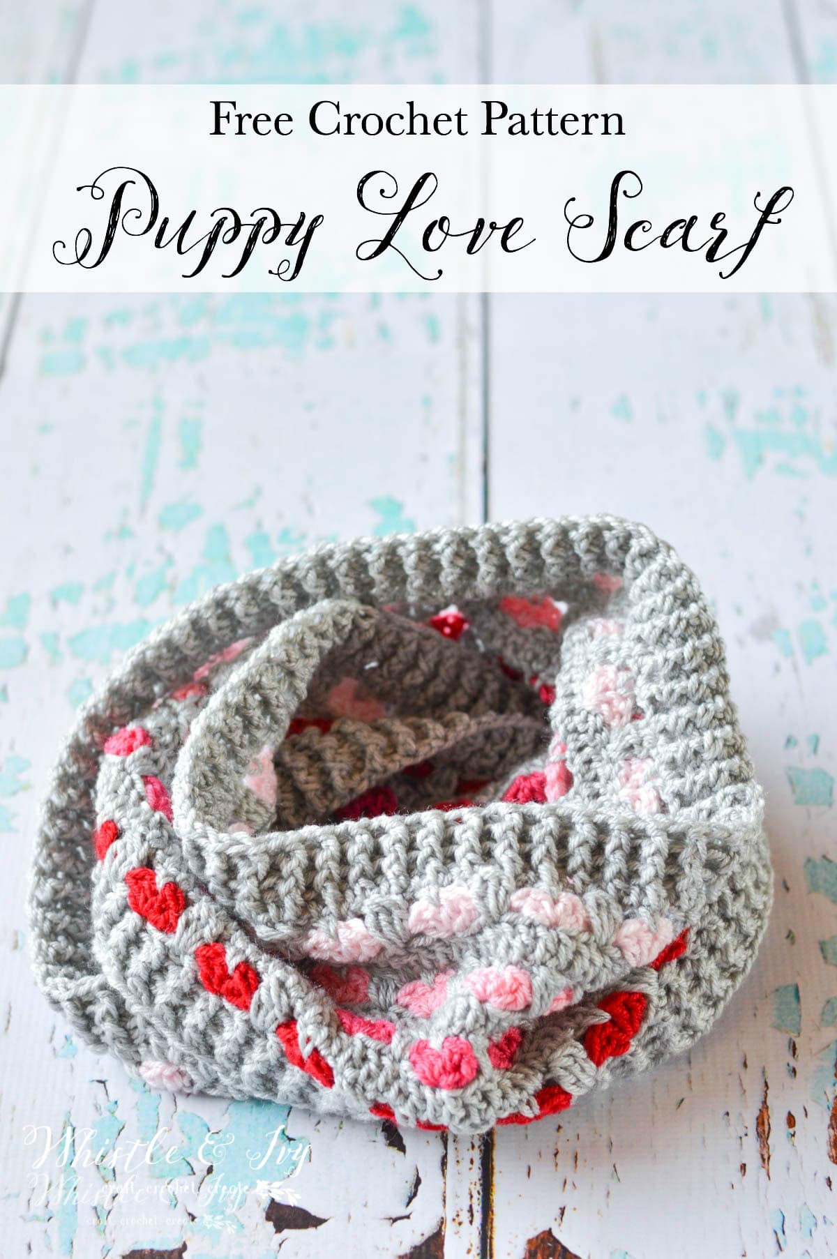 gray crochet infinity scarf pattern featuring red and pink hearts