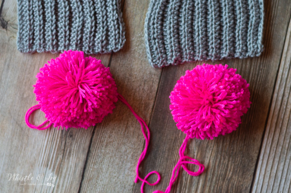 yarn pom-poms and crochet scarf 