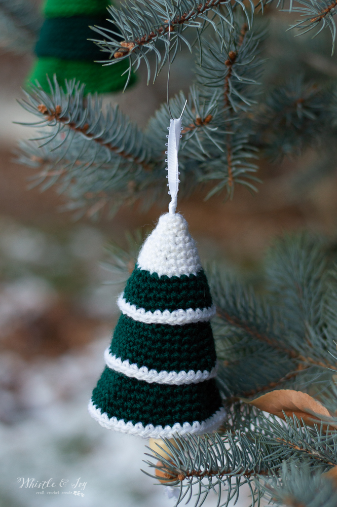 snow topped crochet Christmas tree shaped ornament for holiday 